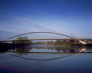 Millennium Bridge, pre-compressed arch footbridge, across the River Ouse at dawn, architects Whitby Bird Bridges, York, Yorkshire, England, United Kingdom, Europe