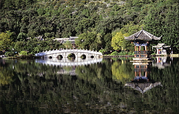 Pavilion and bridge at Black Dragon Pool, Lijiang, Yunnan Province, China, Asia