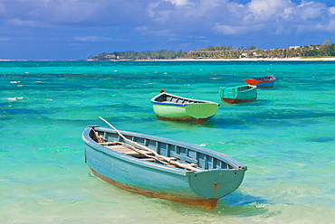 Small fishing boats in the turquoise sea, Mauritius, Indian Ocean, Africa