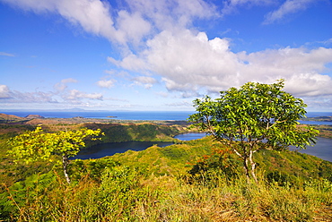 Volcanic lake and the coast of Nosy Be from Mont Passot, Madagascar, Indian Ocean, Africa