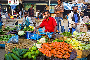 Man selling vegetables in Barisal, Bangladesh, Asia