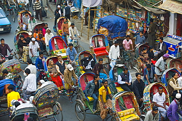 Busy rickshaw traffic on a street crossing in Dhaka, Bangladesh, Asia