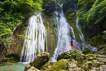 Woman looking at the beautiful Mele-Maat cascades in Port Vila, Island of Efate, Vanuatu, South Pacific, Pacific