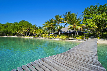 Wooden pier leadin to a resort on Aore islet before the Island of Espiritu Santo, Vanuatu, South Pacific, Pacific