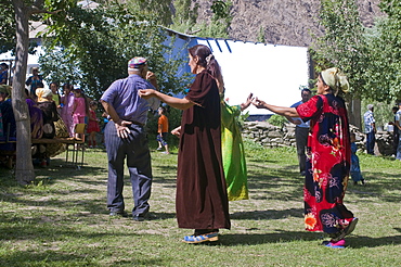 Dancing guests at wedding of Pamiris, Bartang Valley, Tajikistan, Central Asia, Asia