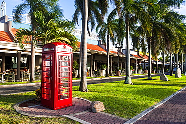 Red telephone box in downtown Oranjestad, capital of Aruba, ABC Islands, Netherlands Antilles, Caribbean, Central America