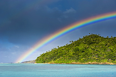 Incredble rainbow over an islet off Ofu Island, Manua Island group, American Samoa, South Pacific, Pacific