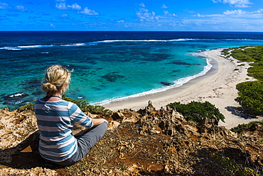 Tourist enjoying the beautiful scenery of Barbuda, Antigua and Barbuda, West Indies, Caribbean, Central America