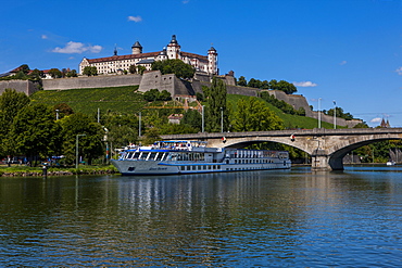 Cruise ship on the Main valley in Wurzburg, beyond Fortress Marienberg, Franconia, Bavaria, Germany, Europe