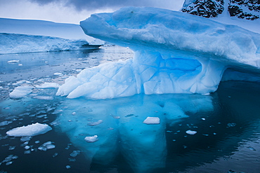 Huge glaciers shining blue, Danco Island, Antarctica, Polar Regions 