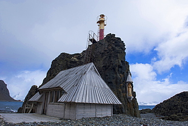 Little chapel and lighthouse at the Henryk Arctowski Polish Antarctic Station, King George Island, South Shetland Islands, Antarctica, Polar Regions 