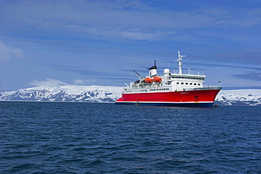 Cruise ship anchoring in the volcanic crater of Deception Island, South Shetland Islands, Antarctica, Polar Regions