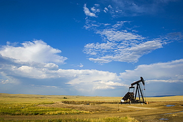 Oil rig in the savannah of Wyoming, United States of America, North America