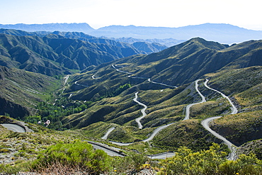 Serpentine bends in road going up the mountain, near Mendoza, Argentina, South America 