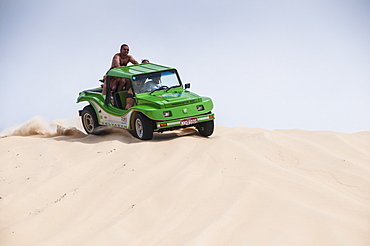 Riding down the sand with sand buggies in Natal, Rio Grande do Norte, Brazil, South America