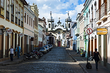 Road with colonial buildings leading to the Nossa Senhora do Carmo church in Sao Joao del Rei, Minas Gerais, Brazil, South America