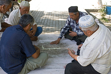 Men playing dominos, Bokhara, Uzbekistan, Central Asia, Asia