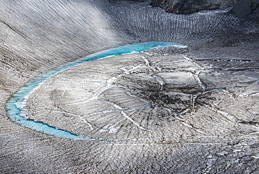 Blue glacial water in a glacier on Mutnovsky volcano, Kamchatka, Russia, Eurasia  