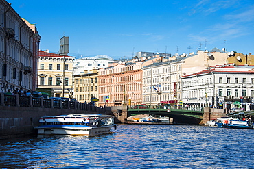 Tourist boat on a water channel in the center of St. Petersburg, Russia, Europe