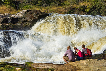 Tourists watching the stunning Murchison Falls (Kabarega Falls), Murchison Falls National Park, Uganda, East Africa, Africa