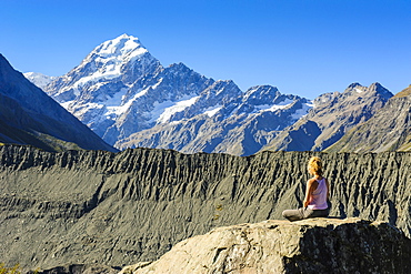 Woman enjoying the view of Mount Cook, UNESCO World Heritage Site, South Island, New Zealand, Pacific