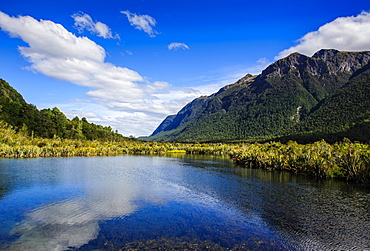 Mountains reflecting in the Mirror Lakes, Eglinton Valley, Fiordland National Park, UNESCO World Heritage Site, South Island, New Zealand, Pacific