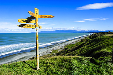 Signpost on Te Waewae Bay, along the road from Invercargill to Te Anau, South Island, New Zealand, Pacific 
