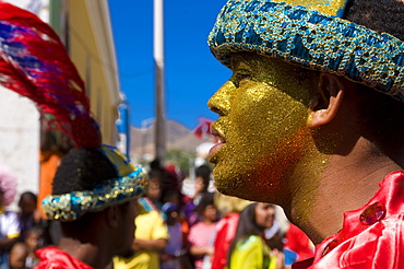 Portrait of young man with cap and coloured face, Carnival, Mindelo, Sao Vicente, Cape Verde, Africa