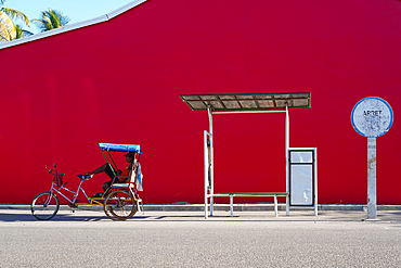 Taxi Brousse Bus stop and a cyclo-pousse in Morondava, Western Madagascar, Africa