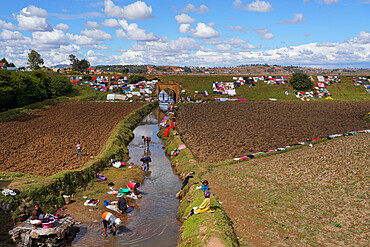 People doing laundry and drying it along the railway, Antsirabe, Central Madagascar, Africa