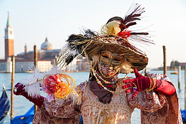 Masks at the Venice Carnival in St. Mark's Square, Venice, Veneto, Italy, Europe