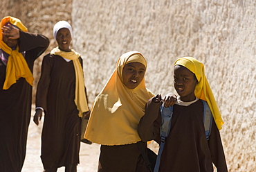 Girls stepping out of school in Harar, Ethiopia, Africa