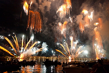 The amazing fireworks display during the night of Redentore celebration in the basin of St. Mark, Venice, Veneto, Italy, Europe