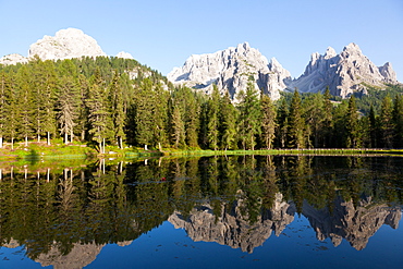 Reflections at sunset on Antorno Lake, Misurina, Tre Cime di Lavaredo, Belluno, Dolomites, Italy, Europe