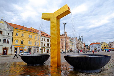 One of the three modern gold fountains in the Republic Square, Pilsen (Plzen), West Bohemia, Czech Republic, Europe