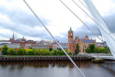 The Peace Bridge and the Guildhall in Derry, County Londonderry, Ulster, Northern Ireland, United Kingdom, Europe