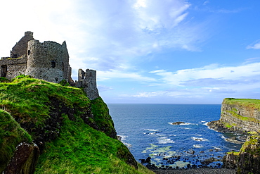 Dunluce Castle, located on the edge of a basalt outcropping in County Antrim, Ulster, Northern Ireland, United Kingdom, Europe