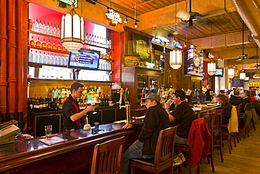 Patrons enjoying a drink at a pub, Toronto, Ontario, Canada, North America