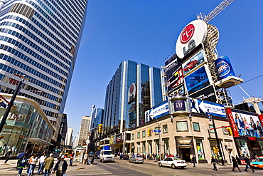 Intersection of Young Street and Dundas Street, showing part of Eaton Center, as viewed from Dundas Square, Toronto, Ontario, Canada, North America