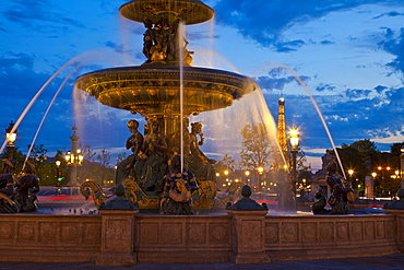 Water fountain and Eiffel Tower at night, Place de la Concorde, Paris, France, Europe