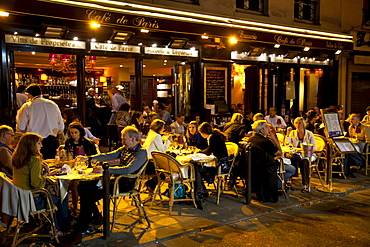 People dining at night, Left Bank, Paris, France, Europe