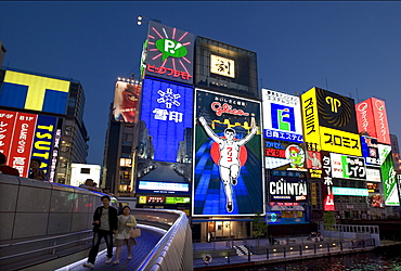 Famous neon wall with Glico runner advert in Dotonbori district of Namba, Osaka, Japan, Asia