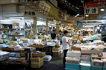 Interior view of sales stalls at Tsukiji Wholesale Fish Market, the world's largest fish market in Tokyo, Japan, Asia