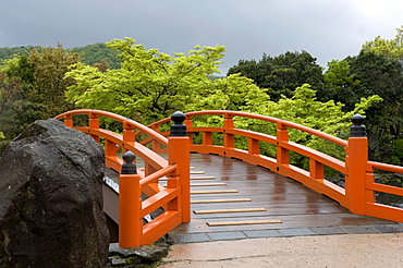 Vermilion-colored arched bridge at Murasaki Shikibu Park in Takefu City, Fukui, Japan