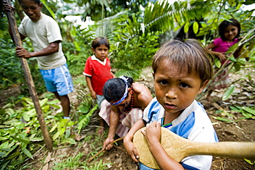 The village Syndico of Suwa community with his family, Amazon, Ecuador, South America