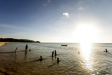 Children play on Simpang Mengayau beach, an emerging eco tourism destination in the Tun Mustapha Park, Malaysian Borneo, Malaysia, Southeast Asia, Asia 