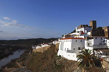 The 13th century castle and walled city, with a strong Islamic history, overlooking the Guadiana River, Mertola, Alentejo, Portugal, Europe