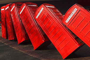 British red K2 telephone boxes, David Mach's Out of Order sculpture, at Kingston-upon-Thames, a suburb of London, England, United Kingdom, Europe