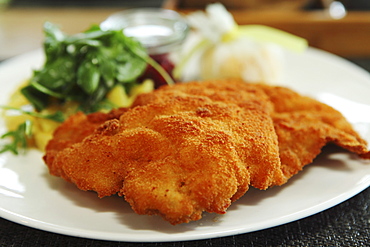 Wiener schnitzel, the popular breadcrumb coated cutlet of veal, a traditional Germanic dish, served in Munich, Bavaria, Germany, Europe