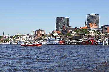 Shipping runs along the waterfront of the St. Pauli district, by the River Elbe, in Hamburg, Germany, Europe